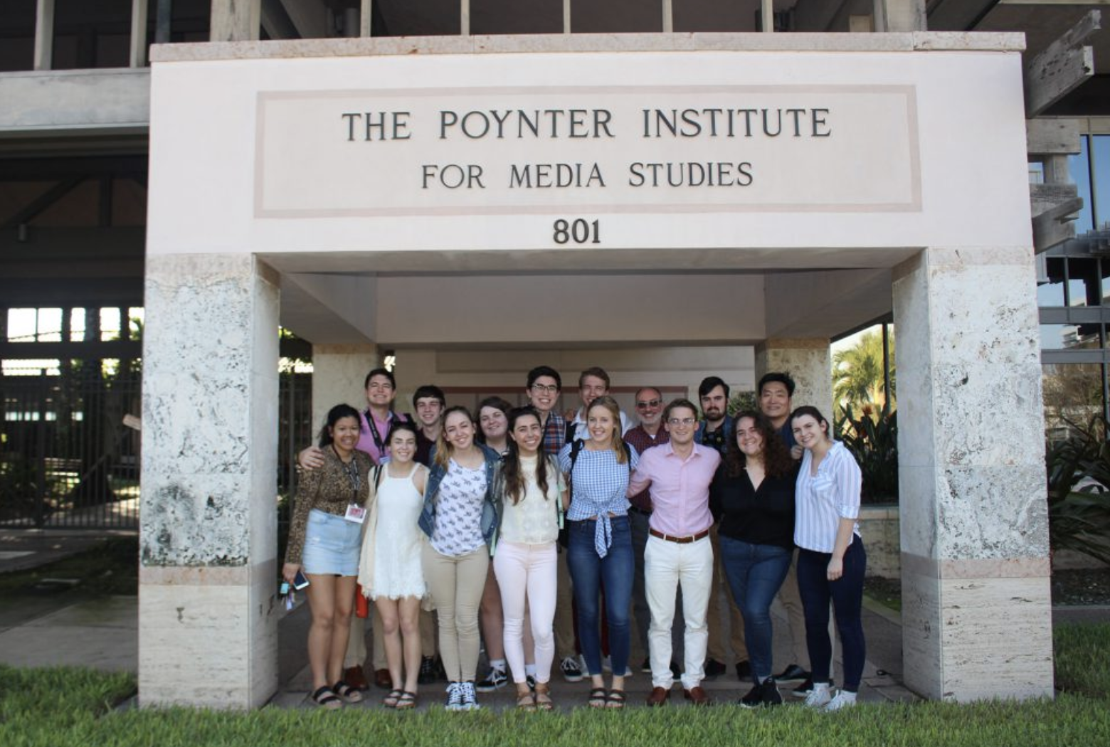 Students pose in front of the Poynter Institute in St. Petersburg, Florida.