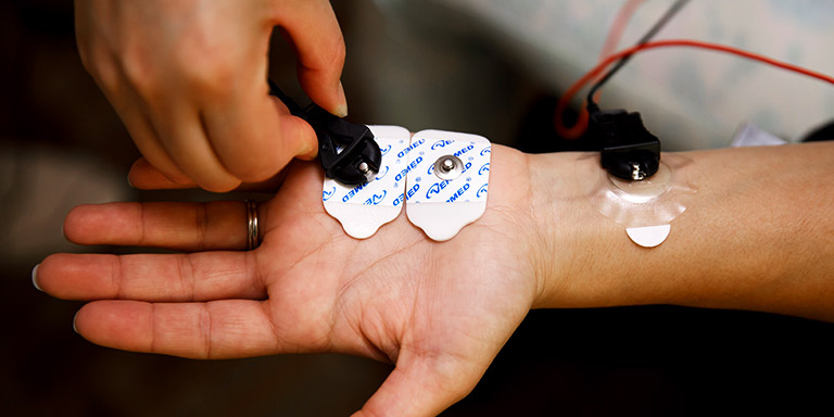 Research nodes are placed on a hand.